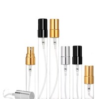 Mini botellas de vidrio recargables para perfume de 2ml, 5ml, 10ml, 15ml en colores plateado, dorado y negro.