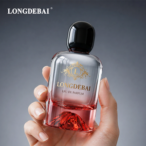 Botella de Perfume de Vidrio Transparente Vacía con Tapa Dorada Pesada y Base Volcánica Roja, Cilindro Transparente con Cierre a Presión, 30ml 50ml 100ml - Product Image 1