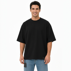 Camiseta Unisex Negra de Cuello Redondo, Corte Regular, Manga Corta, Color Sólido, Jersey de Algodón, Ropa Casual para Todas las Temporadas, Transpirable, Estilo Holgado - Product Image 1