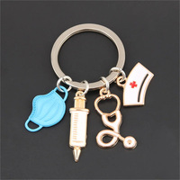 Porte-clés en alliage pour masque de protection infirmier/médecin, cadeau de remerciement pour le personnel médical, vente en gros