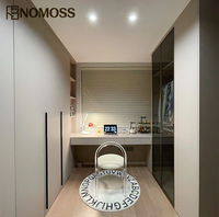Armoire sur mesure élégante avec système de rangement moderne et service de conception personnalisée pour projets immobiliers de luxe