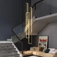 Luminaires suspendus géométriques modernes en aluminium et acrylique pour escaliers d'hôtel à plafond haut, longue escalier, hauteur réglable, personnalisables AC