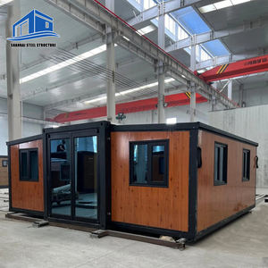 Maison conteneur extensible ShanHai à vendre avec abri <span class=keywords><strong>de</strong></span> <span class=keywords><strong>jardin</strong></span> et distributeur automatique <span class=keywords><strong>de</strong></span> boissons, 2 chambres, design moderne, garantie 1 an - Product Image 1