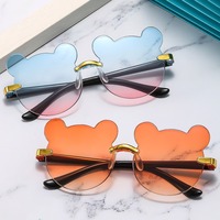 Nuevas gafas de sol redondas sin montura con orejas de oso bonitas a la moda para niños de alta calidad se pueden personalizar al por mayor