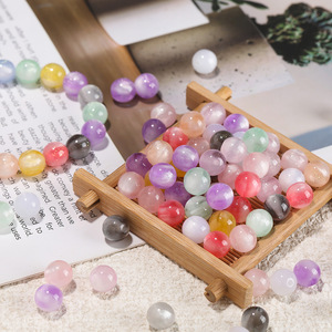 Cuentas perforadas de resina de colores variables ópticamente, cuentas sueltas redondas de 10 y 12 mm para hacer joyería DIY, pulseras, collares y manualidades. - Product Image 2