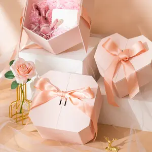 กล่องบรรจุภัณฑ์สีชมพูที่ว่างเปล่า OEM ที่กำหนดเองกระดาษแข็งรูปหัวใจกล่องของขวัญกระดาษสำหรับวาเลนไทน์และงานแต่งงาน
