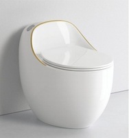Cuvette de toilette ronde monobloc en forme d'oeuf pour hôtel de luxe, toilette en céramique montée au sol pour salle de bain