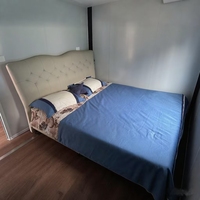 Villa de capsule de maison de conteneur de bâtiment en acier confortable de haute qualité pour l'extérieur avec des gardes de gouttière