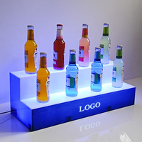 Vente en gros d'usine de nouveaux présentoirs à vin personnalisés pour bouteilles d'alcool en acrylique Glorifier Étagères de bar éclairées par LED