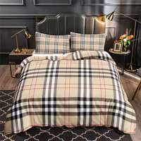 Vente en gros de linge de lit de luxe personnalisé avec un design à carreaux classique imprimé numériquement en 3D, draps, taies d'oreiller, housse de couette