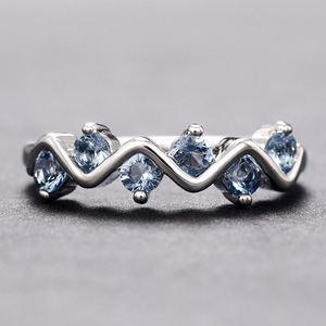 Anello a Onda con Zircone Blu per Donne, Gioiello da Dito di Design Unico e Alla Moda - Product Image 1