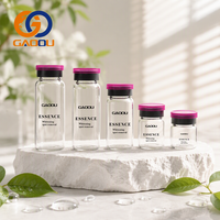 Tube en verre rond avec logo estampé or, capacité de 12 ml à 30 ml, couleur personnalisée