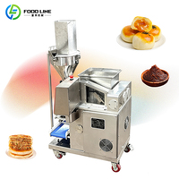 Machine d'encrustation automatisée pour la fabrication d'aliments fourrés, équipement pour une production entièrement automatisée