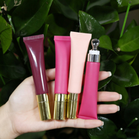 Metal applicator tube met gekleurde lipgloss, fruit lipolië, private label, vegan, transparant, nude, bruin, peptide, vloeibare boterbalsem