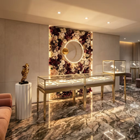 Comptoir de présentation de bijoux en acier inoxydable de luxe, vitrine en verre sur pieds hauts pour boutique de bijoux haut de gamme, vitrine vintage à LED