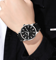 Montre SKMEI 9303 à cadran texturé pour jeunes professionnels, avec fonctions date et jour, commande en gros pour détaillants de montres décontractées et professionnelles