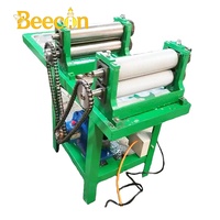 Nouvelle presse à cire d'abeille électrique commerciale pour plaques plates avec garantie d'un an pour la fabrication de feuilles de cire d'abeille