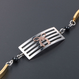 Pulsera de acero de titanio para mujer de estilo coreano con diseño de lazo chapado en oro CE471 - Product Image 3