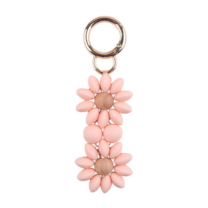 Vente en gros de porte-clés en perles de style nouveau, design de fleur de dessin animé en perles de silicone, idéal comme bijoux, pendentifs de sac - Product Image 1