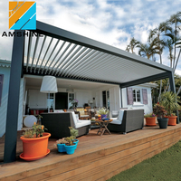 Pergola en aluminium motorisée à toit ouvrant réglable avec lames orientables et éclairage LED pour restaurant et café en plein air