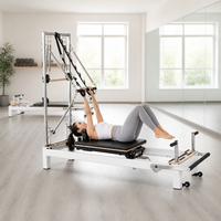 Reformer de Pilates en alliage d'aluminium avec barre de pieds réglable et ressorts, design compact et peu encombrant pour la maison, la salle de sport et l'entraînement en studio