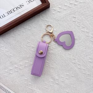 Étui de protection portable en cuir pour rouge à lèvres, style féminin, avec porte-clés et breloque de sac à dos pour baume à lèvres - Product Image 1