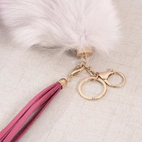 Vente en gros de porte-clés en queue de renard véritable de qualité du fabricant, accessoire coloré en peau de teint par cravate pour les vêtements de voitures nolisées personnalisées