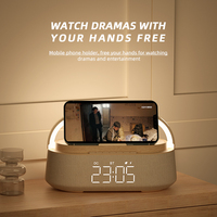KUANGXIANG Modern Smart Wekker met Draadloze Lader, BT Speaker, Sfeerverlichting, FM Radio en Telefoonhouder