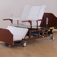 Lit médical électrique multifonctionnel manuel avec dossier réglable et barrières de sécurité latérales pour les soins quotidiens à domicile des personnes âgées et des patients à long terme