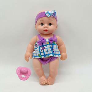 Muñeca Bebé Profesional de 27 cm con Chupete, Traje Morado y Diadema con Lazo para Niños y Niñas - Product Image 3