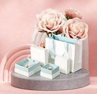 Sacs cadeaux de luxe pour bijoux et cosmétiques, avec logo personnalisé du fabricant, pour cadeaux de mariage, avec ruban et poignées