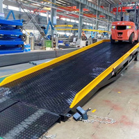 Pont d'accès mobile électrique pour le chargement et le déchargement de marchandises dans et hors des conteneurs