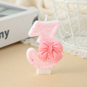 Bougie d'anniversaire rose numéro 1 avec nœud et paillettes pour la décoration de gâteau de la première année des enfants - Product Image 3