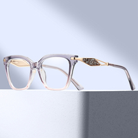MS 81798 Nouvelles lunettes anti-lumière bleue pour femme, monture œil de chat translucide, branches métalliques ajourées incrustées de strass en losange, polyvalentes