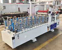 Machine d'enrobage et de laminage de profilés en bois WPC MDF PVC Machine d'enrobage de profilés en film PVC à colle froide pour cadre de porte
