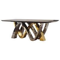 Ensemble de table à manger de conception royale du marché du mobilier de Foshan, moderne, 8 chaises, base en métal doré rose