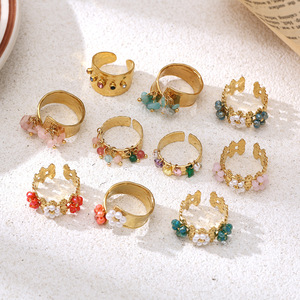Bague OZE pour femme en acier inoxydable électroplaqué, motif fleur de gravier, bijou polyvalent et tendance avec pierre naturelle et cristal - Product Image 1