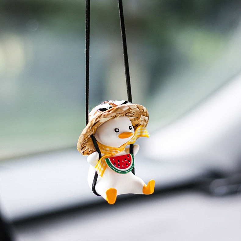 Lunettes noires melon chapeau de paille pendentif canard