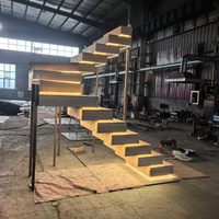 Nouveau produit d'escalade : Escalier intérieur à poutre unique, marches en bois massif, escalier flottant en bois foncé