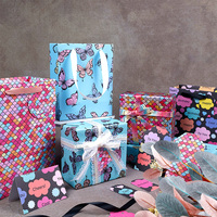 Papier d'emballage de luxe personnalisé pour cadeaux de fête, papier d'emballage jetable de haute qualité, motif papillon et fleurs, revêtement laser, 43x300cm, vente en gros