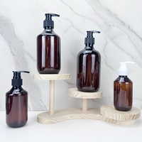 Bouteille pompe Boston à épaule ronde 200ml 300ml 400ml 500ml pour lotion, gel douche, sérum et shampoing en plastique PET