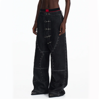 Jeans en denim brut lourd avec rivets en forme d'aile d'avion, style streetwear
