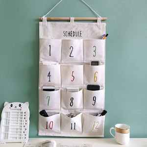 Sac de rangement suspendu sur la porte avec 12 poches, organisateur mural en toile - Product Image 1