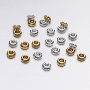 Cuentas espaciadoras de aleación de zinc de 7 mm en colores oro antiguo y plata mixtas para suministros de fabricación de joyería DIY - Product Image 1