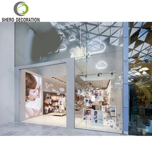 Meubles de présentation élégants pour magasin de bébé, design de haute qualité, étagères pour vêtements d'enfants, vitrines avec supports de présentation en métal pour vêtements - Product Image 3