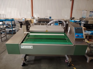 DZD-1100 de scelleuse sous vide en continu Fabrication de machine d'emballage sous vide avec prix d'usine - Product Image 2