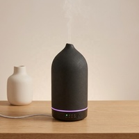 Diffuseur d'arômes ultrasonique en céramique noir mat de haute qualité unique avec 7 types d'LED pour une utilisation domestique