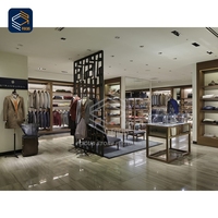 Dernière conception de vitrine métallique de magasin de créateurs, solution d'aménagement de boutique, présentoirs pour vêtements