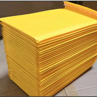 Enveloppes d'expédition matelassées colorées écologiques personnalisées en papier kraft pour livraison express de chaussettes, chaussures, fourrure