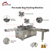 Machine d'emballage automatique multifonctionnelle HAOYUAN HY-100 à haute efficacité avec écran tactile PLC pour l'entrée et la sortie de sacs préformés